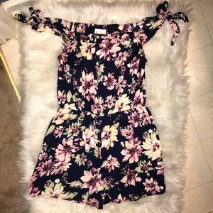 Cute floral/navy romper.  Great condition.  Sz L